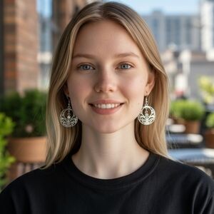 Silver dangle earrings with rhinestone decor